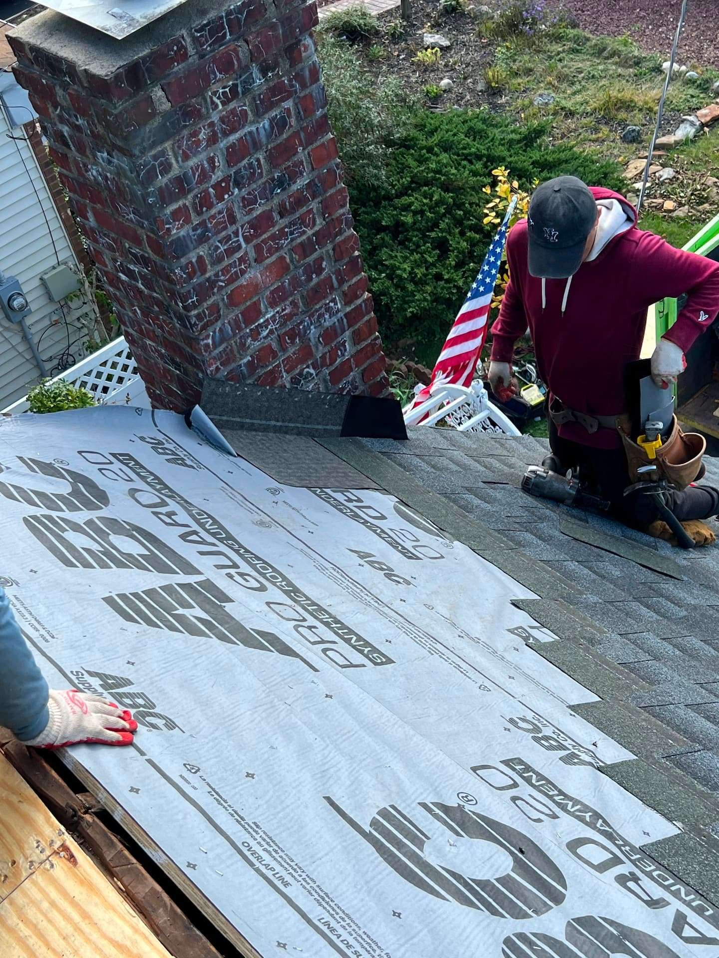 The VT1 Roofing & Chimney crew at work on a residential roof