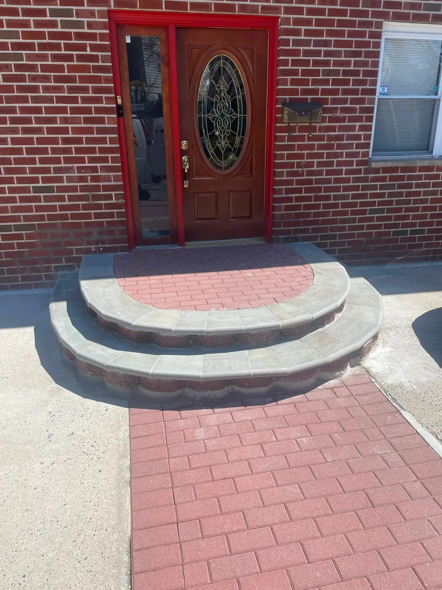 Finished stone masonry retaining wall